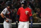 Twins slugger Miguel Sano talked with Detroit catcher James McCann as he went to bat in the seventh inning Friday night as a pinch hitter.