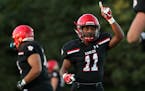 Eden Prairie wide receiver Daejon Wolfe (11) celebrated after scoring a touchdown in the first half in a 41-13 rout of Lakeville North on Friday.
