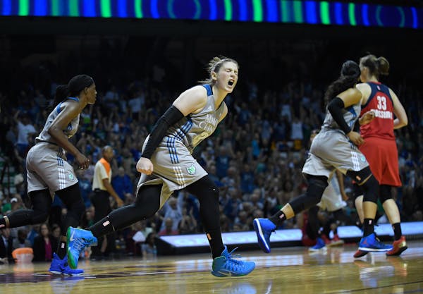 Minnesota Lynx guard Lindsay Whalen (13) celebrated after scoring a layup to put the Minnesota Lynx up by five points in the fourth quarter.