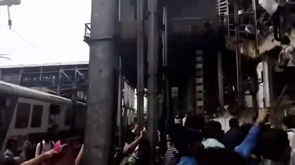 Scores dead in stampede at India train station
