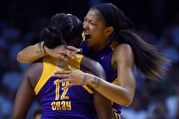 Los Angeles Sparks forward Candace Parker (3) celebrated with guard Chelsea Gray (12) after a traveling violation was called against Minnesota Lynx fo