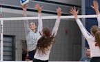 Champlin Park junior Izzy Ashburn went up for a tip against Elk River on Tuesday night. The Rebels defeated the Elks 25-20, 25-19, 25-20.