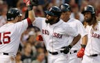 The Red Sox's Jackie Bradley Jr., center, celebrated his three-run home run with, from left, Dustin Pedroia, Rafael Devers and Hanley Ramirez during t