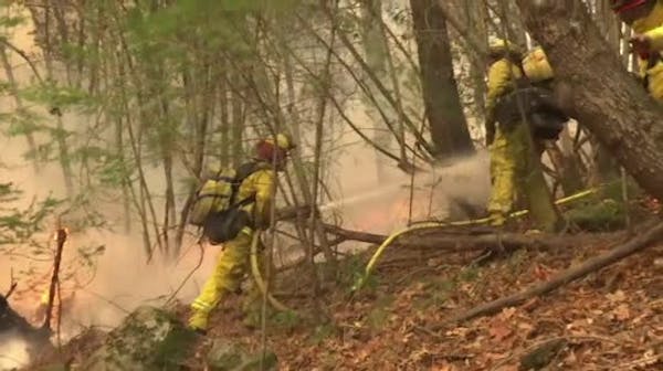 Raw: Crews battle raging wine country flames