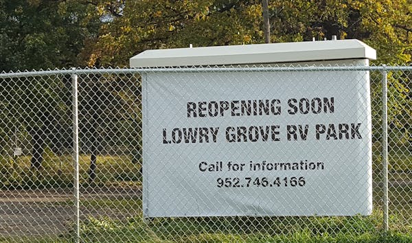 The company that closed Lowry Grove mobile home park is suing the city, alleging that city officials induced it to oust "undesirable" residents from S