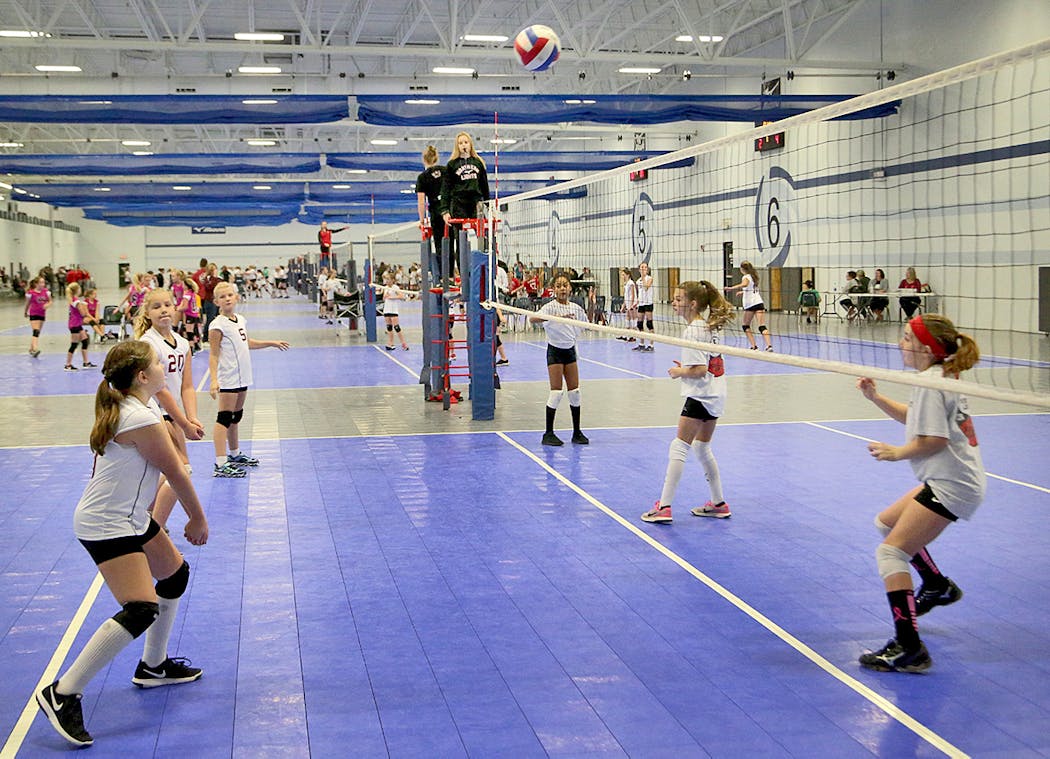 As part of her work with Northern Lights, Grutzmacher referees a volleyball tourney at the Midwest Volleyball Warehouse in Burnsville.