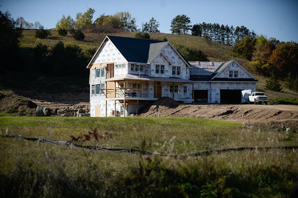 A home is under construction in Birch Park on Friday afternoon. Homebuilding in St. Croix County, Wis., once the state’s fastest-growing county, con