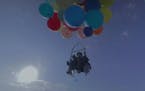 Party balloons lift adventurer over South Africa