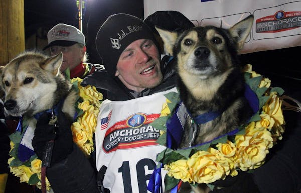 Former Iditarod champion denies doping dogs