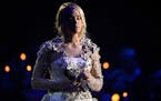 Carrie Underwood performed "Softly and Tenderly" during an In Memoriam tribute at the 51st annual CMA Awards on Wednesday in Nashville.