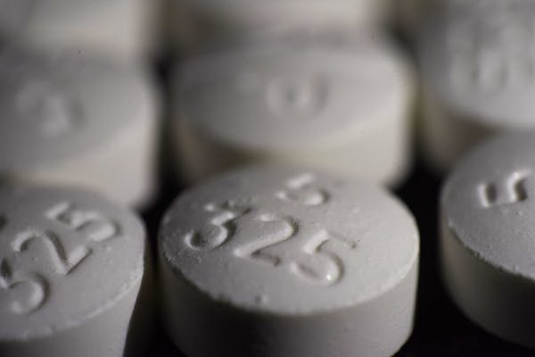 Oxycodone-acetaminophen pills. County attorneys in Minnesota on Thursday announced lawsuits against drug manufacturers and distributors for the public