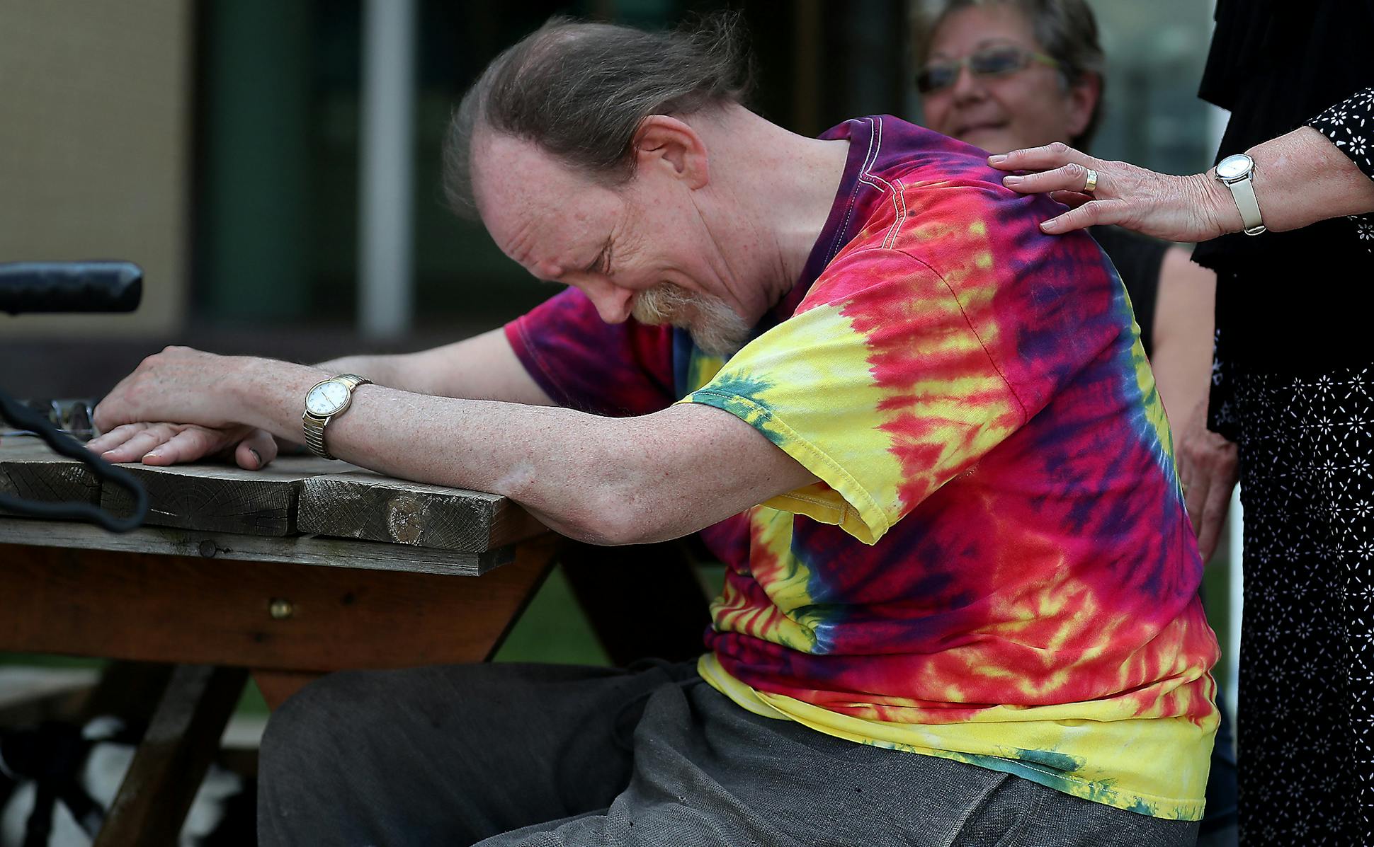 Robert Krause, surrounded by family, sobbed outside the courthouse in July as he heard that his mother's attacker had pleaded guilty to sexual assault. The family didn't know about the attack until nearly a year after she died.