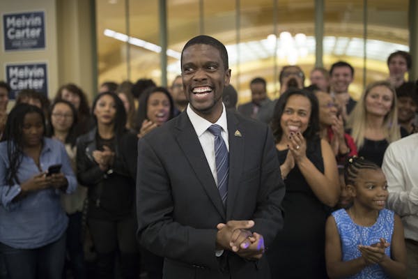 St. Paul mayoral candidate Melvin Carter celebrated his win with family and friends on Tuesday night. (Jerry Holt/Star Tribune)