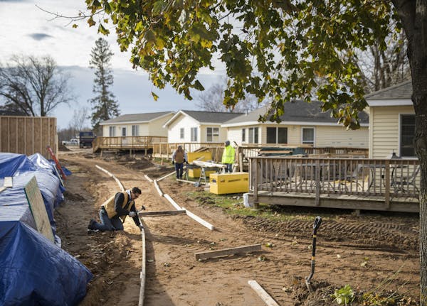 Recent improvements at the Veterans Campground on Big Marine Lake in Washington County included work on new sidewalks between cabins during the first 
