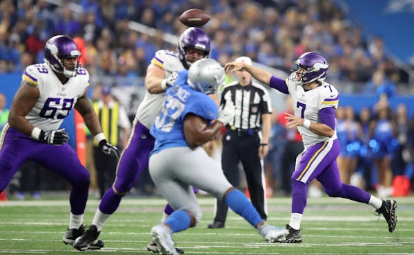 Minnesota Vikings quarterback Case Keenum (7) completed a pass during the first quarter at Ford Field Thursday November 23, 2017 in Detroit , MI.