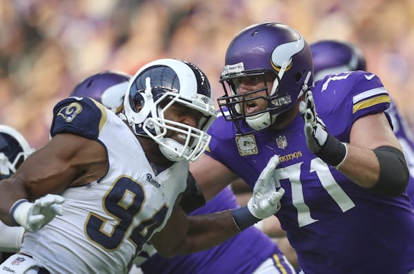 Vikings tackle Riley Reiff stops the Rams Robert Quinn. Reiff came to the Vikings after Minnesota let Matt Kalil go to Carolina.