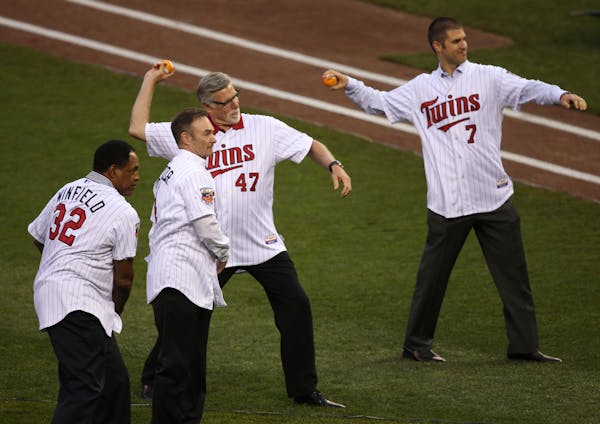 From left: Dave Winfield, Paul Molitor, Jack Morris and Joe Mauer threw out ceremonial first pitches during the 2014 MLB Home Run Derby at Target Fiel