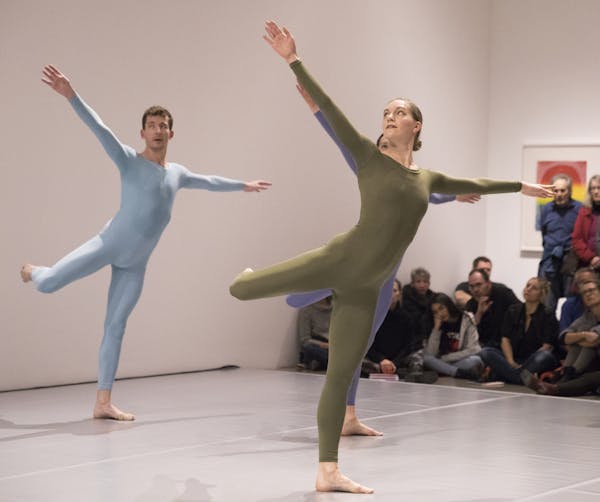 Merce Cunningham dancers Dylan Crossman, left, and Jamie Scott performed in the Walker galleries.