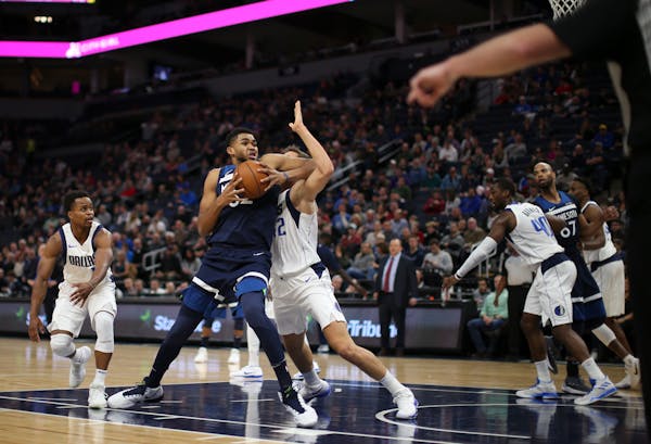 Timberwolves center Karl-Anthony Towns was fouled in the first quarter by Dallas forward Maximilian Kleber