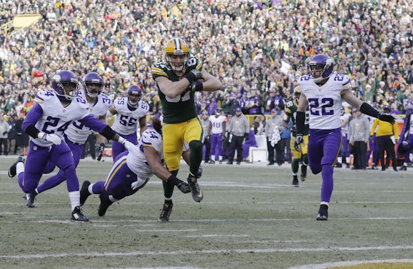 Green Bay Packers’ Jordy Nelson gets past Minnesota Vikings’ Eric Kendricks for a touchdown catch during the first half in 2016 in Green Bay, Wis.