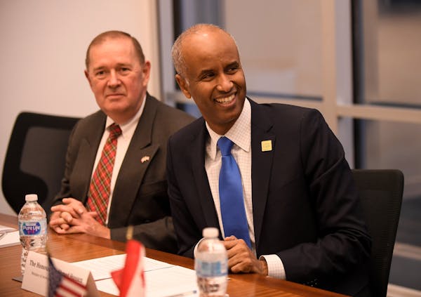 Ahmed Hussen, Canada’s immigration minister and a former Somali refugee, listened as refugee resettlement advocates and officials introduced themsel