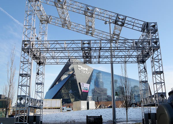 Signs of the Super Bowl buildup are starting to appear, including temporary construction at the Commons outside of U.S. Bank Stadium.