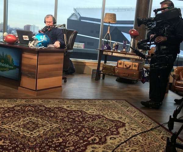 Dan Patrick brought his radio show to the Twin Cities ahead of Super Bowl LII, seen above broadcasting Tuesday.