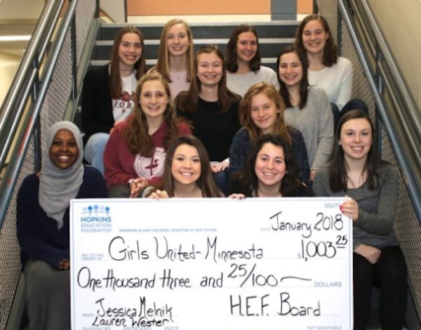 Members of Girls United MN with a grant from the Hopkins Education Foundation.