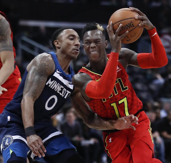 Hawks guard Dennis Schroder drove against Wolves guard Jeff Teague during the first half Monday night in Atlanta.