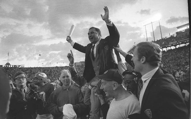 Kansas City Chiefs Coach Hank Stram is carried from the field, Jan. 11, 1970, in New Orleans, after his team defeated the Minnesota Vikings in Super B