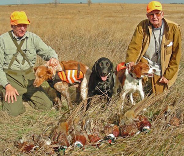 Dick Duerre (to Ed Crozier’s left, with a haul of pheasants not many years ago in North Dakota.