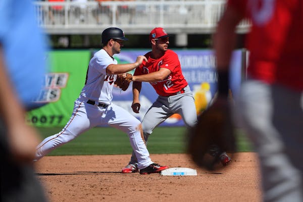 Cardinals infielder Paul DeJong tagged out Twins outfielder Zack Granite at second base in the fourth inning Monday.