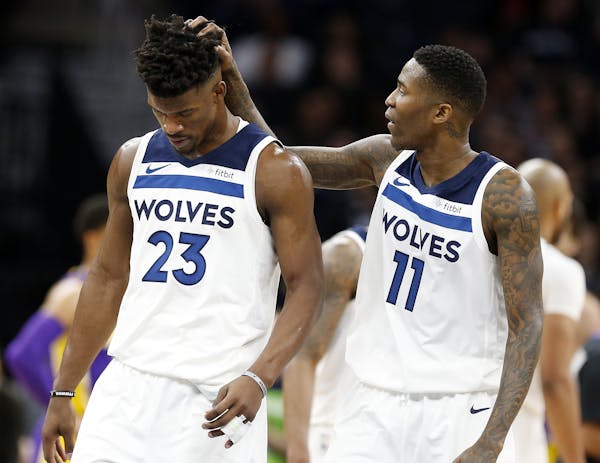 Jamal Crawford, right, is encouraged by the Wolves’ standing at the All-Star break, but Jimmy Butler wants and expects much more.
