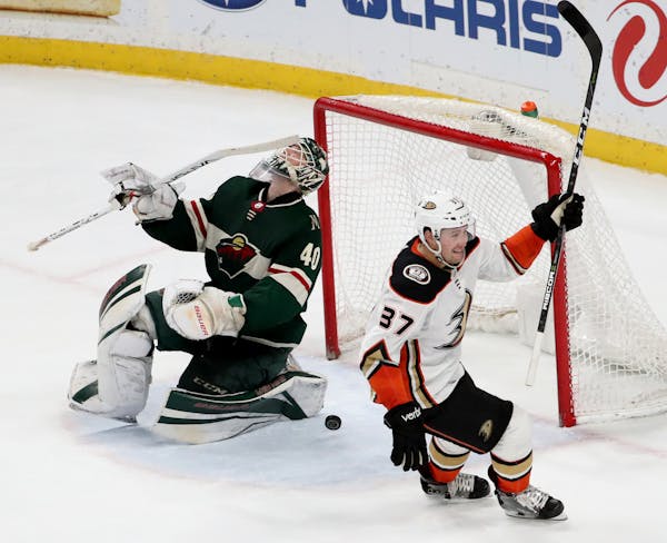 Following a tie in overtime, Minnesota Wild goalie Devan Dubnyk (40) couldn't stop an 11th-round shootout goal by the Anaheim Ducks' Nick Ritchie (37)