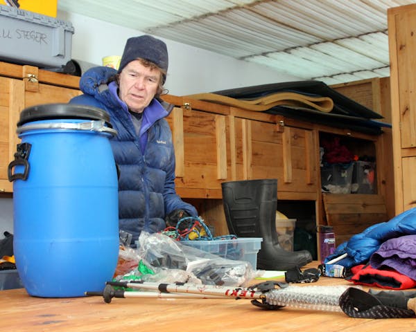 Will Steger prepared for his solo hike at his home in Ely. He’s conscious of the weight of his gear down to the ounce. See a closer look on the back