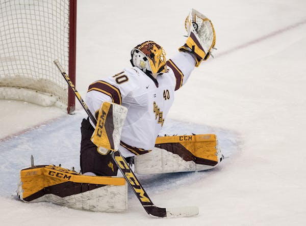 Gophers goalie Mat Robson made a glove save against St. Cloud State in early January. (Star Tribune photo by CARLOS GONZALEZ, cgonzalez@startribune.co