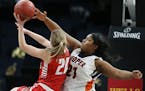 Hawks Kierra Wheeler blocked Sadie Raitz shot during girls class 3A semifinals action at Target Center Thursday March 15, 2018 in Minneapolis, MN.] Th