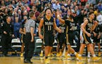 Gabe Kalscheur (11) celebrated the first of his two three-pointers in the closing minute of play that helped DeLaSalle to an 80-78 victory over Orono.