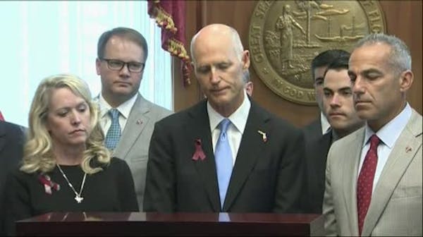 Florida Gov. Scott signs compromise gun control bill