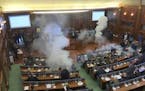 Unhappy legislators unleash tear gas during floor vote in Kosovo