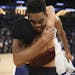 Timberwolves All-Star center Karl-Anthony Towns hugged his girlfriend on his way off the court after he set a franchise record with his 56-point effor