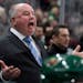 Minnesota Wild head coach Bruce Boudreau reacts to a no goal call against the Boston Bruins during the second period of an NHL hockey game Sunday, Mar