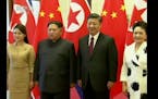 Raw: North Korea's Kim Jong Un visits China's Xi
