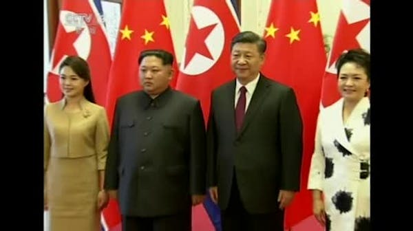 Raw: North Korea's Kim Jong Un visits China's Xi