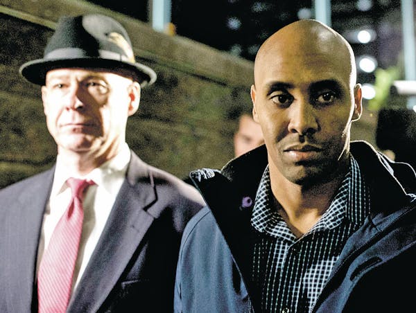 Former Minneapolis police officer Mohamed Noor left the Hennepin County jail with his attorney, Thomas Plunkett.
