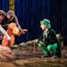 The Lorax — with puppeteers Meghan Kreidler, Rick Miller and H. Adam Harris — faces off against the Once-ler (Steven Epp) in “Dr. Seuss’s The 