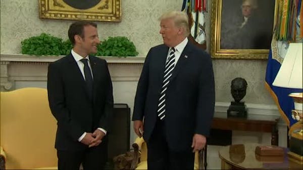 Trump meets with Macron, warns Iran
