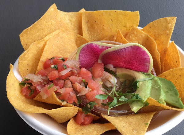 Bat & Barrel, the new restaurant at Target Field, has everything from ceviche at its walk-up window, above, to steak and poke at its full service dini