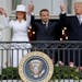 President Donald Trump, first lady Melania Trump, French President Emmanuel Macron and his wife Brigitte Macron stand on the Truman Balcony during a S