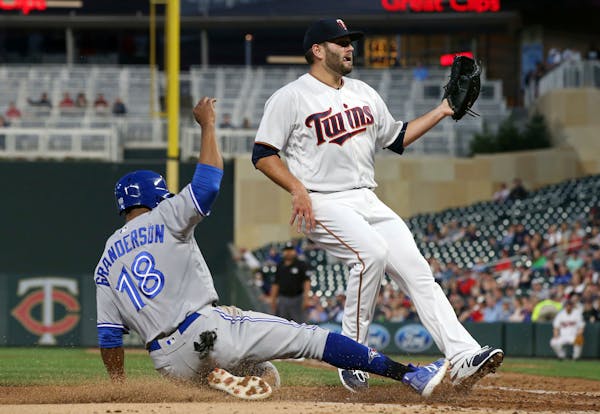 Curtis Granderson came home as Twins starter Lance Lynn awaited a throw from catcher Mitch Garver, whose passed ball led to the run.